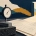 Layered paper illustration of an inspection dial, evidence sheet and open doorway